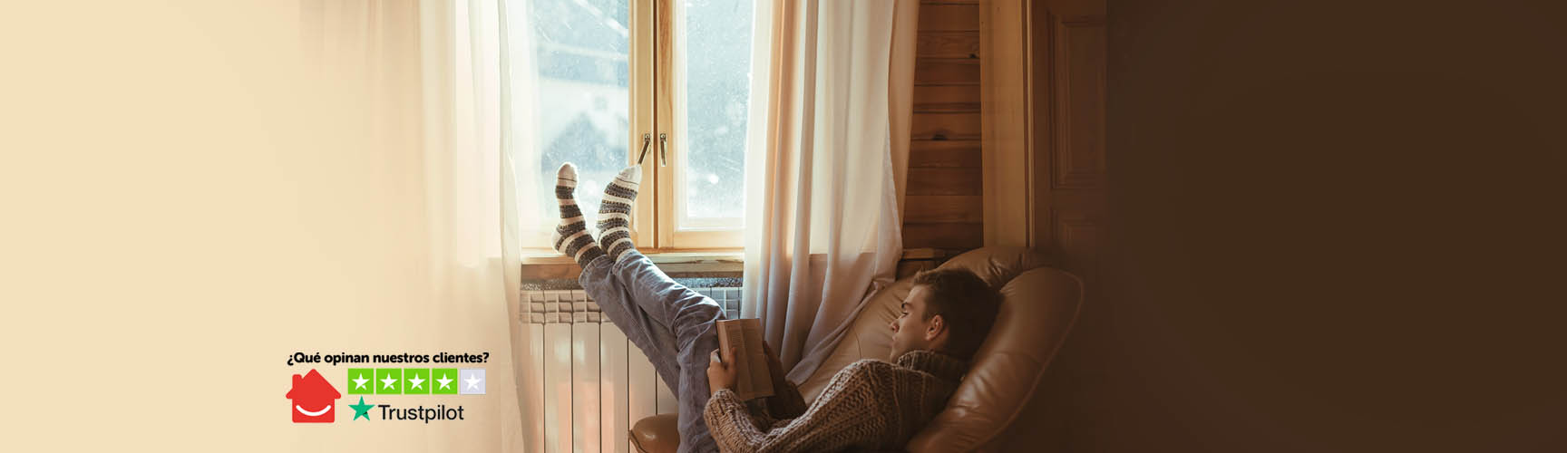 Hombre leyendo libro con pies sobre radiador |HomeServe